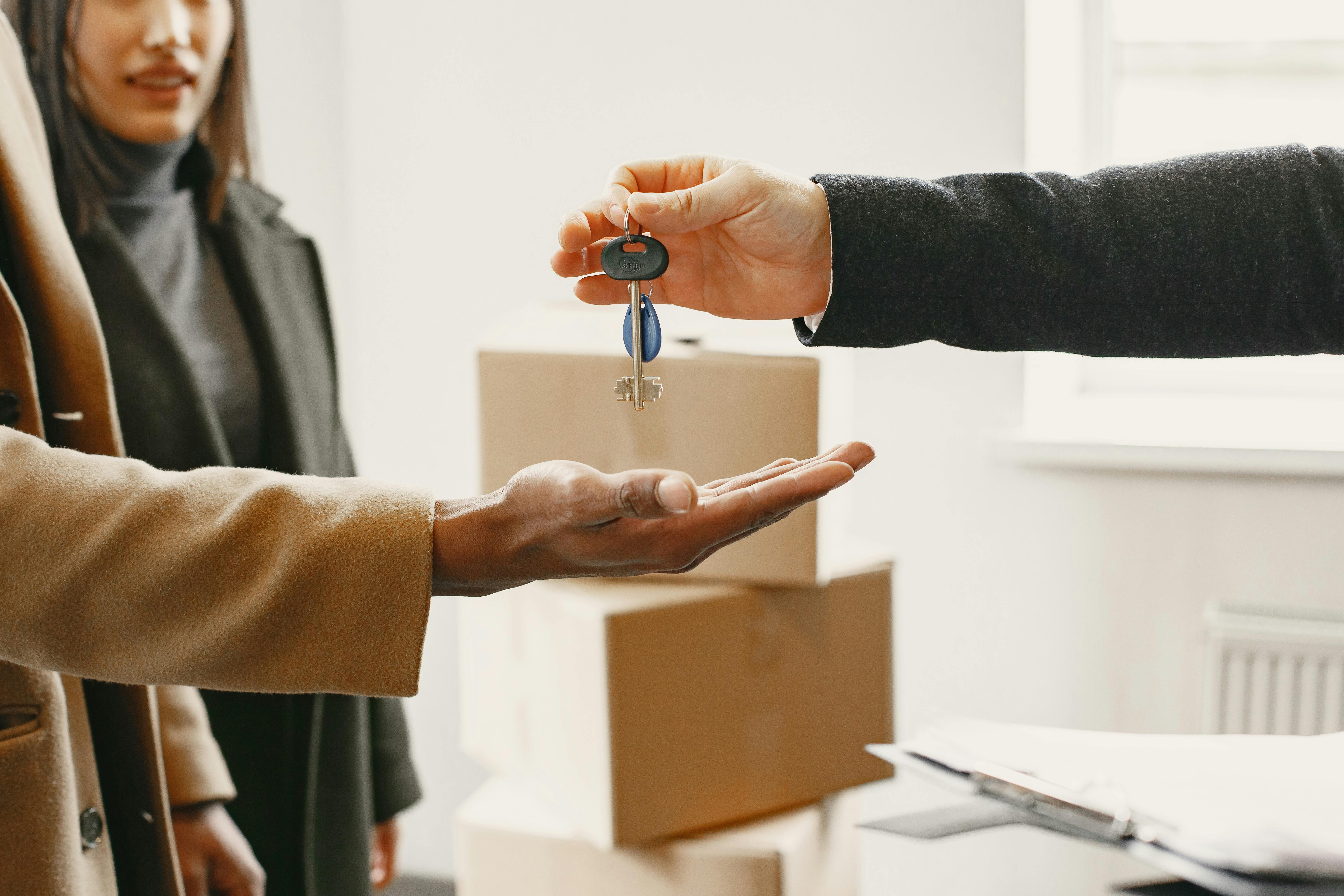 Landlord%20handing%20over%20keys%20to%20quality%20tenants Landlord handing over keys to quality tenants